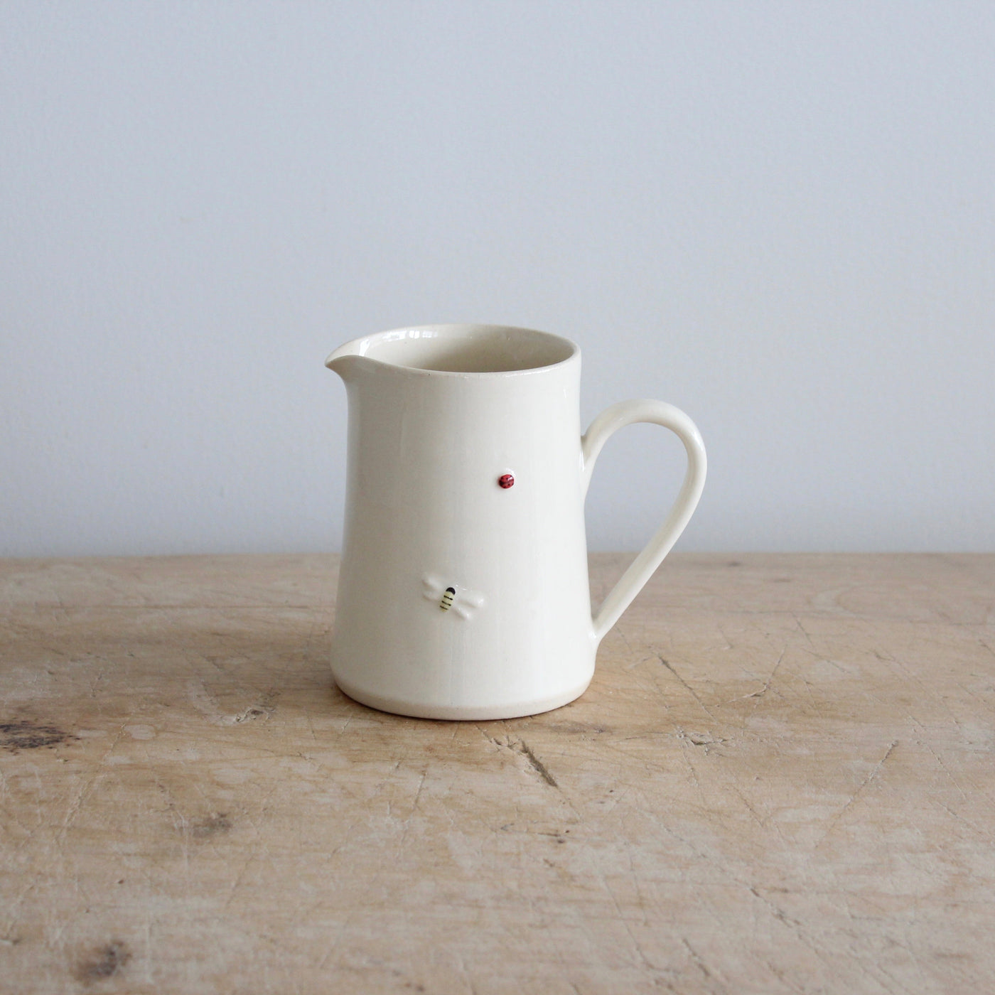 Puriri Lane | Jane Hogben | Jug | Small | Cream | Bee & Ladybug